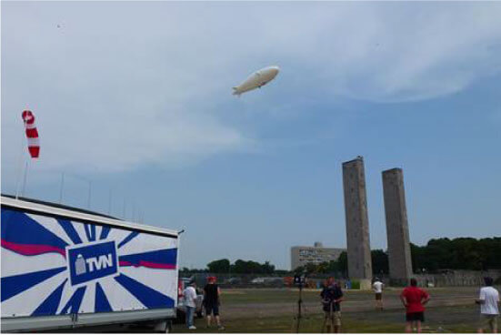 12-m-rc-blimp-flying-over-stadium